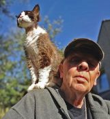 24 ONE MAN AND HIS CAT by Rob Weighill