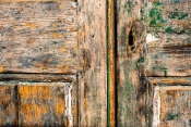 A story of years in the old paint on the doors